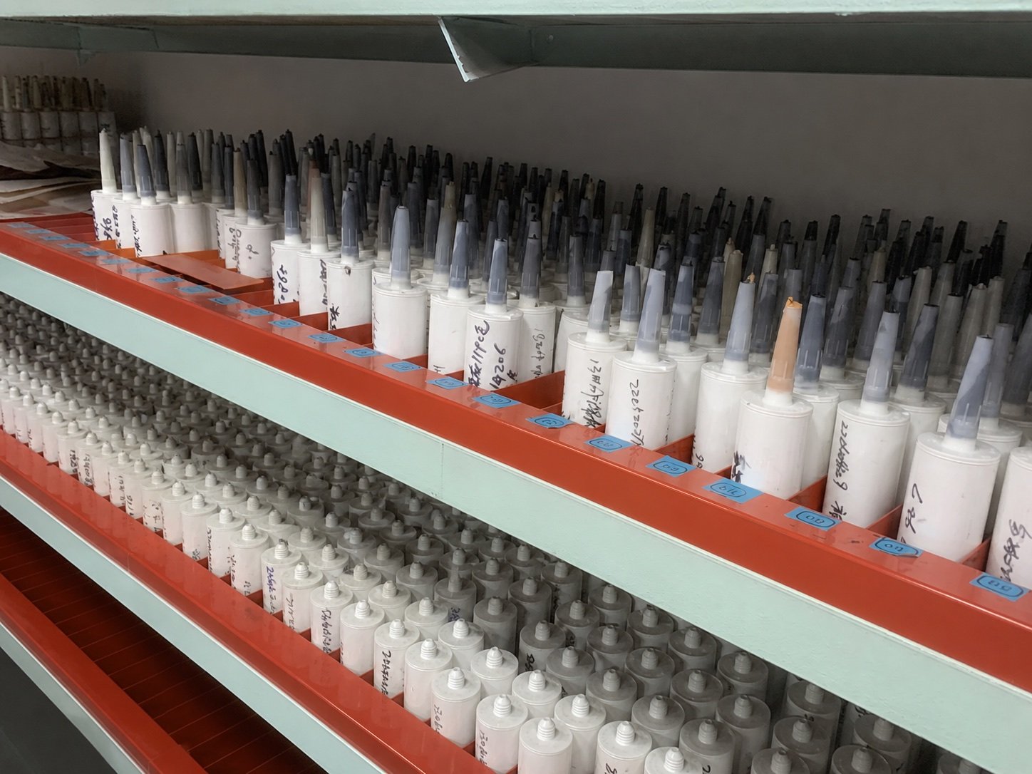 Racked sealant cartridges retained as physical sample references