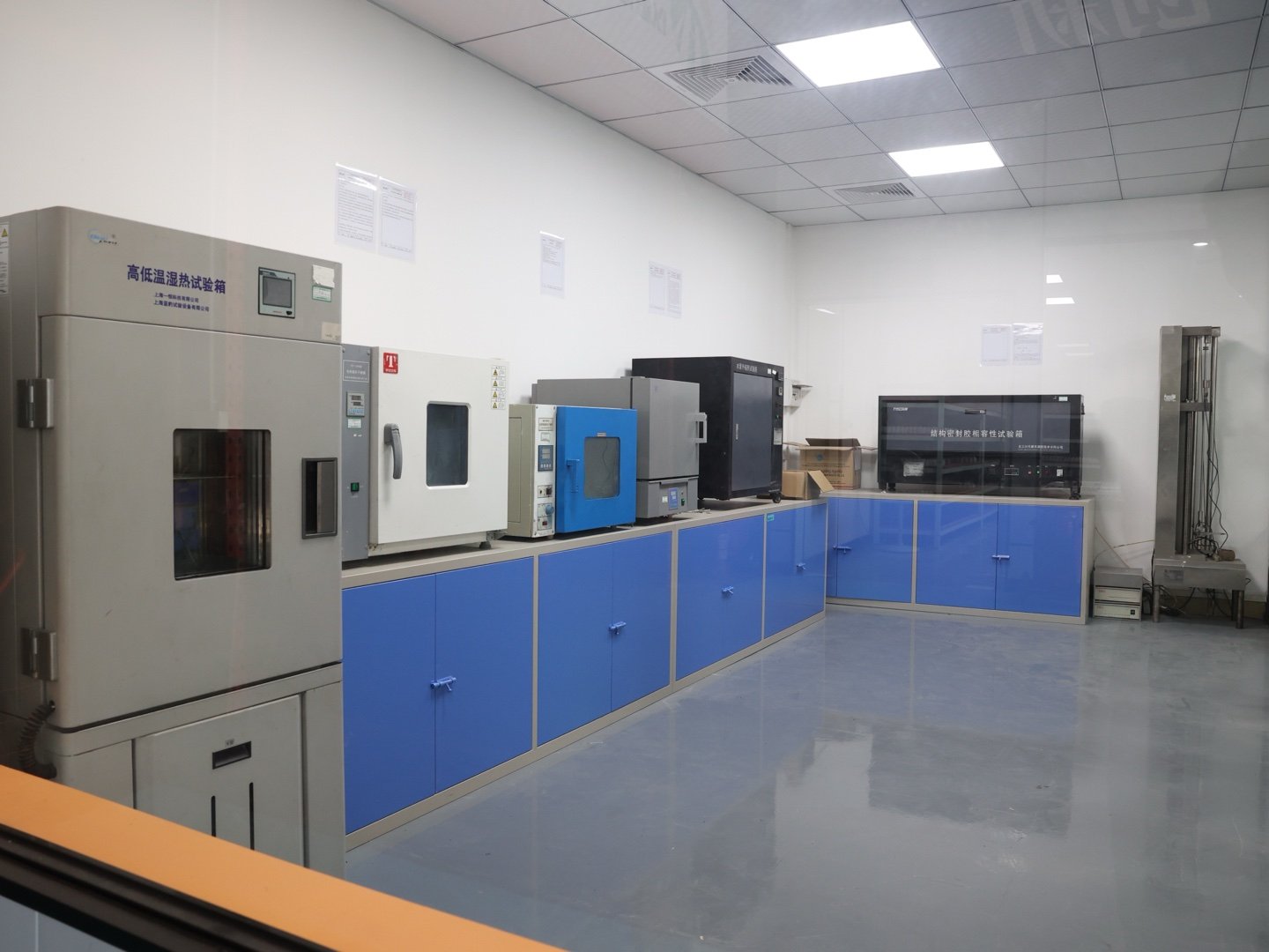 Environmental and material test equipment in a factory equipment room.