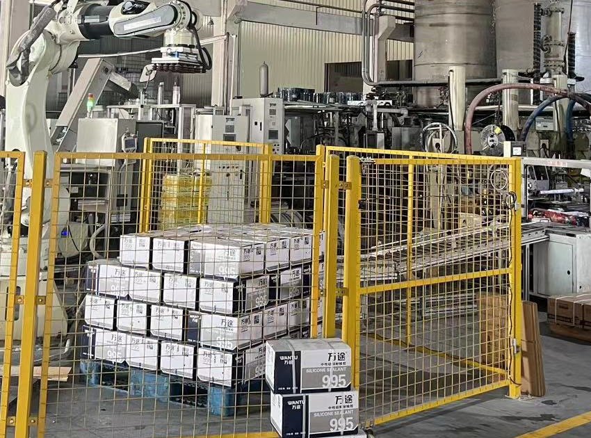 Silicone-sealant cartons in a factory.