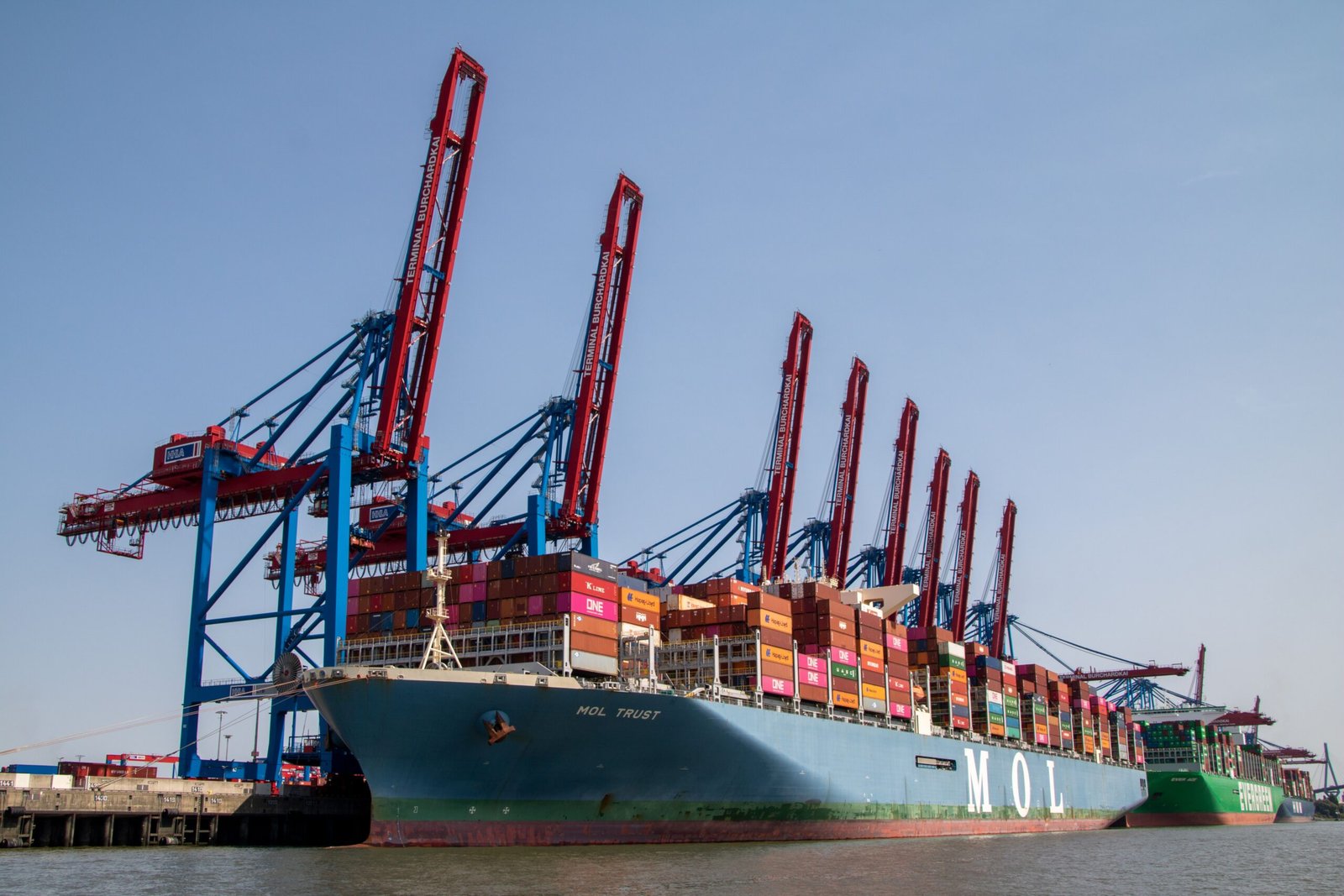 Container ship and freight containers at a port.